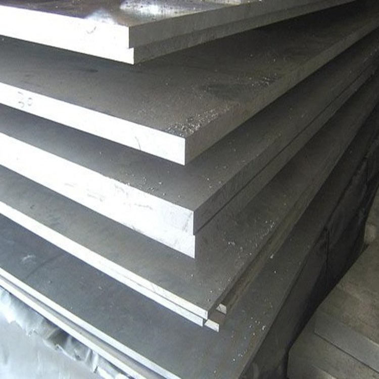 Stacked aluminum plates showing the surface and cut edges